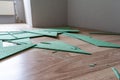 Laminate Underlayment Pieces Lying on Floor, DIY project
