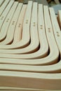 Laminated, wooden parts for furniture production