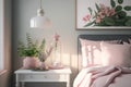 Lamp above table with flowers in pink pastel bedroom interior with window above bed. Real photo Royalty Free Stock Photo