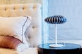 Lamp on bedside table in bedroom Royalty Free Stock Photo