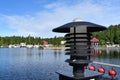 Lamp by the boats` dock in a small town