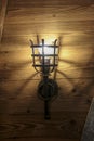 The lamp on the brown wooden