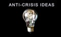 Lamp bulb with a money inside.  Anti-Crisis strategy. Rising on price. New idea concept. No money. Economy crisis, poverty, Royalty Free Stock Photo