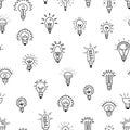 Lamp bulbs seamless pattern. Doodle light bulb various design with flashes and radiance. Thinking, creative overthinking Royalty Free Stock Photo