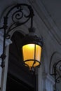 Lamp burning in the night in Paris Royalty Free Stock Photo