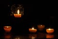 Lamp, candle shining in the darkness. Challis flame. Artistic composition. Royalty Free Stock Photo