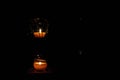 Lamp, candle shining in the darkness. Challis flame. Artistic composition. Royalty Free Stock Photo