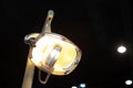Lamp in the dentist\'s office. Lighting equipment in a dental clinic on a dark background. Copy space Royalty Free Stock Photo