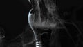 Lamp explosion smoke cloud gray broken light bulb Royalty Free Stock Photo