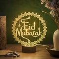 Lamp intricately crafted with Eid Mubarak message, festive ambiance