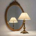 A lamp and its reflection in an oval mirror. Royalty Free Stock Photo
