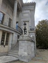 Lamp and lion statue next to stairs at Merchant Exchange Building