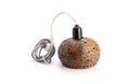 Lamp made from coconut shells on white background