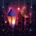 lamp with moon and star hangin to ramadan kareem