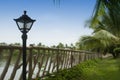 Lamp near a fence Royalty Free Stock Photo