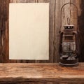 Lamp oil lantern paper blank old wooden Royalty Free Stock Photo