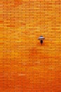 Lamp on orange brick wall Royalty Free Stock Photo