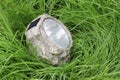 Lamp with photocell in the wet grass Royalty Free Stock Photo