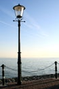 Lamp post along the waterside Royalty Free Stock Photo