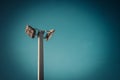 Lamp post electricity industry with blue sky background. Spotlight tower, vintage tone. Royalty Free Stock Photo