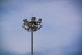 Lamp post electricity industry with blue sky. Spotlight tower. Royalty Free Stock Photo