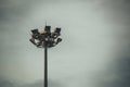 Lamp post electricity industry with blue sky. Spotlight tower. Royalty Free Stock Photo