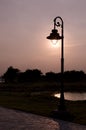 Sunlit lamp post on a dreamy afternoon Royalty Free Stock Photo