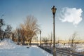 Lamp post on Promenade beside a river Royalty Free Stock Photo