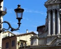 Lamp post in Rome with blue sky in the background Royalty Free Stock Photo