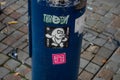 Lampost with Stickers and Tags in Ancoats - Manchester Royalty Free Stock Photo