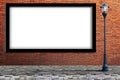 Lamp post street , blank billboard on brick wall