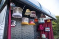 Lamp shades hanging in a public bus stop as a community art installation. Part of If These Walls Could Talk Project