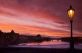 Lamp and Vltava river in the sunset