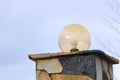 Lamp on the wall of the house fence Royalty Free Stock Photo