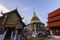 Lampang - Thailand November 3, 2023 : Tourists come to pay homage to the ancient pagoda in Wat Phra That Lampang Luang, a famous