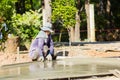 LAMPANG, THAILAND - NOVEMBER 5 : unidentified thai worker leveling concrete with trowel on November 5, 2016 in Lampang, Thailand