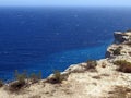 Lampedusa in Italy with Cliff and blue sea Royalty Free Stock Photo