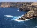 Lampedusa in Italy with Cliff and clean blue sea Royalty Free Stock Photo