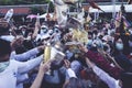 LAMPHUN, THAILAND - MAY 15, 2022: Monks and people pour auspicious water into large bowls to pay homage to the Buddha`s relics Royalty Free Stock Photo