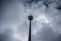 Lamppost Against A Cloudy Sky