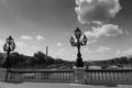 Lamppost on Alexander III bridge on a cloudy day