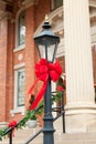 Lamppost Decorated with Red Ribbon for Christmas