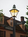 A lamppost with pointers in Colonial Williamsburg.