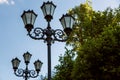 Lamppost with a triple lantern.