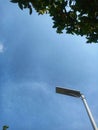 Lampposts soaring under the blue sky Royalty Free Stock Photo