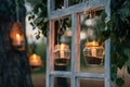 Lamps with candles are hanging on a tree at night. Wedding n