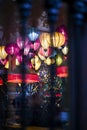 Lamps, colored lanterns inside a pub