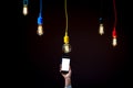 Lamps in colorful plafonds with smart phone