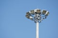 Lamps on high pole with blue sky