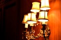 LAMPS ARE PORTABLE WALL LIGHT & BLACK & RED BACKGROUND .
